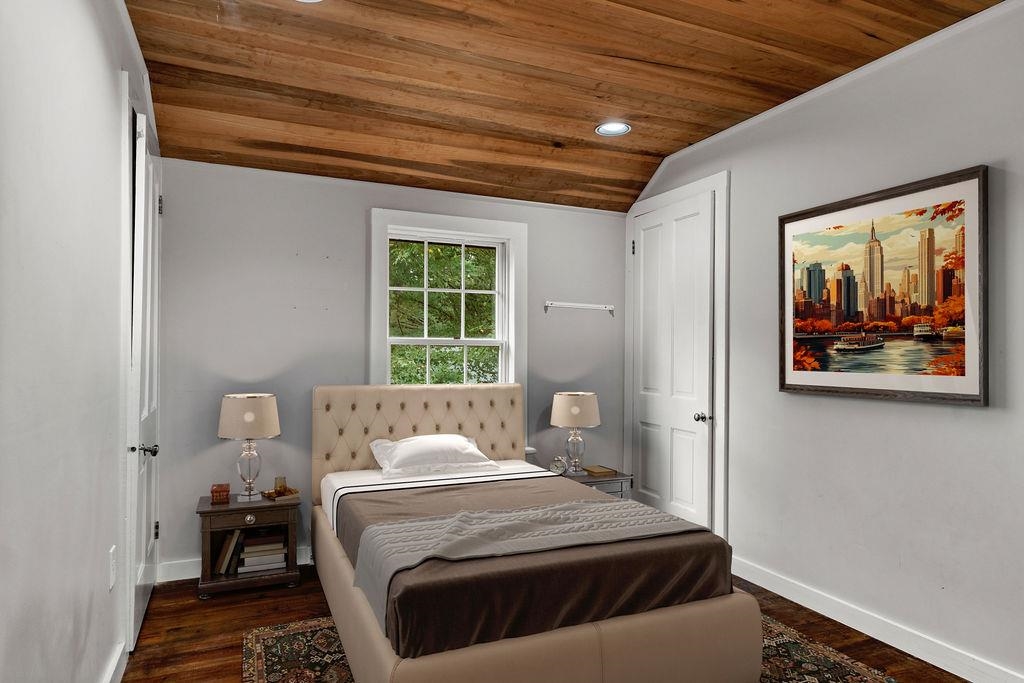 8787 Thorny Branch Road Bridgewater, VA 22812 - Photo 37 of 46 a bedroom with a bed and wooden floor