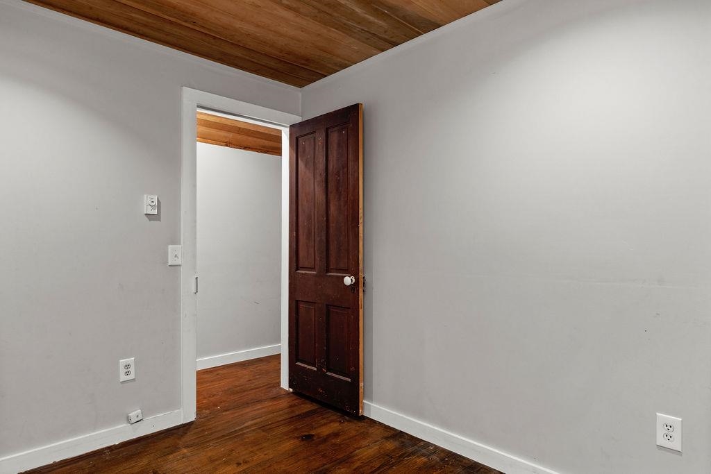 8787 Thorny Branch Road Bridgewater, VA 22812 - Photo 39 of 46 a view of an empty room with wooden floor
