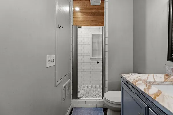 a bathroom with sink and mirror