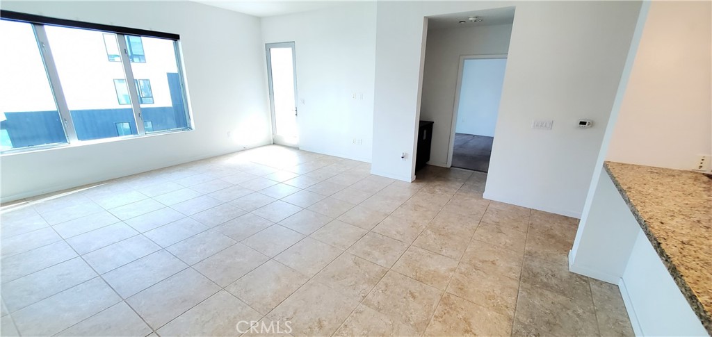 21 Gramercy, Unit 307 Irvine, CA 92612 - Photo 17 of 65 an empty room with windows