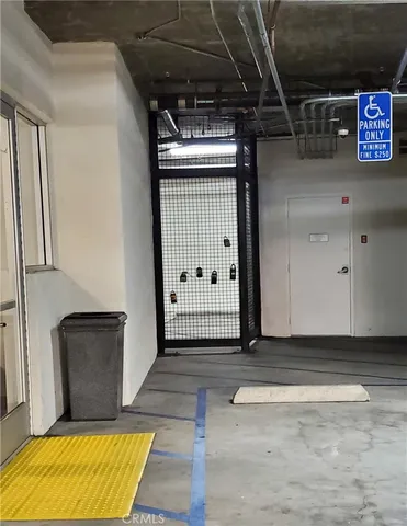 a view of a patio with a table and chairs and potted plants