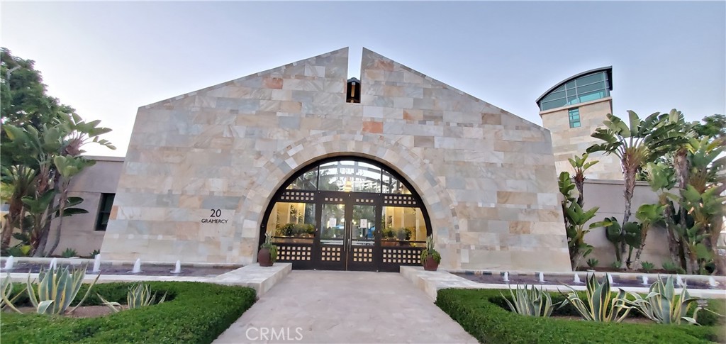 21 Gramercy, Unit 307 Irvine, CA 92612 - Photo 43 of 65 a front view of a house with garden
