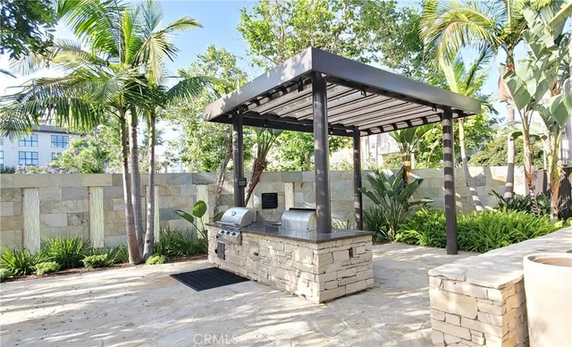 a view of kitchen with a sink and a stove