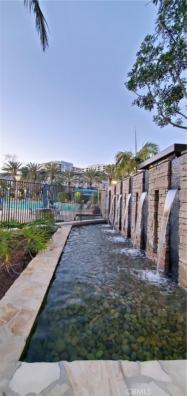 21 Gramercy, Unit 307 Irvine, CA 92612 - Photo 56 of 65 a view of a backyard