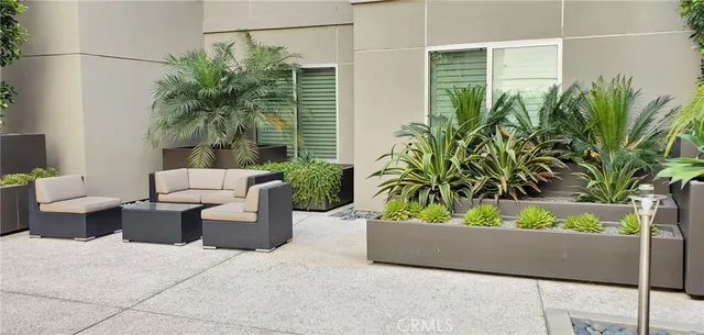 a buildings with trees in front of it