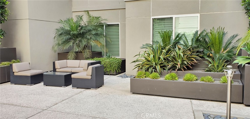 21 Gramercy, Unit 307 Irvine, CA 92612 - Photo 6 of 65 a potted plant sitting on a floor and a potted plant