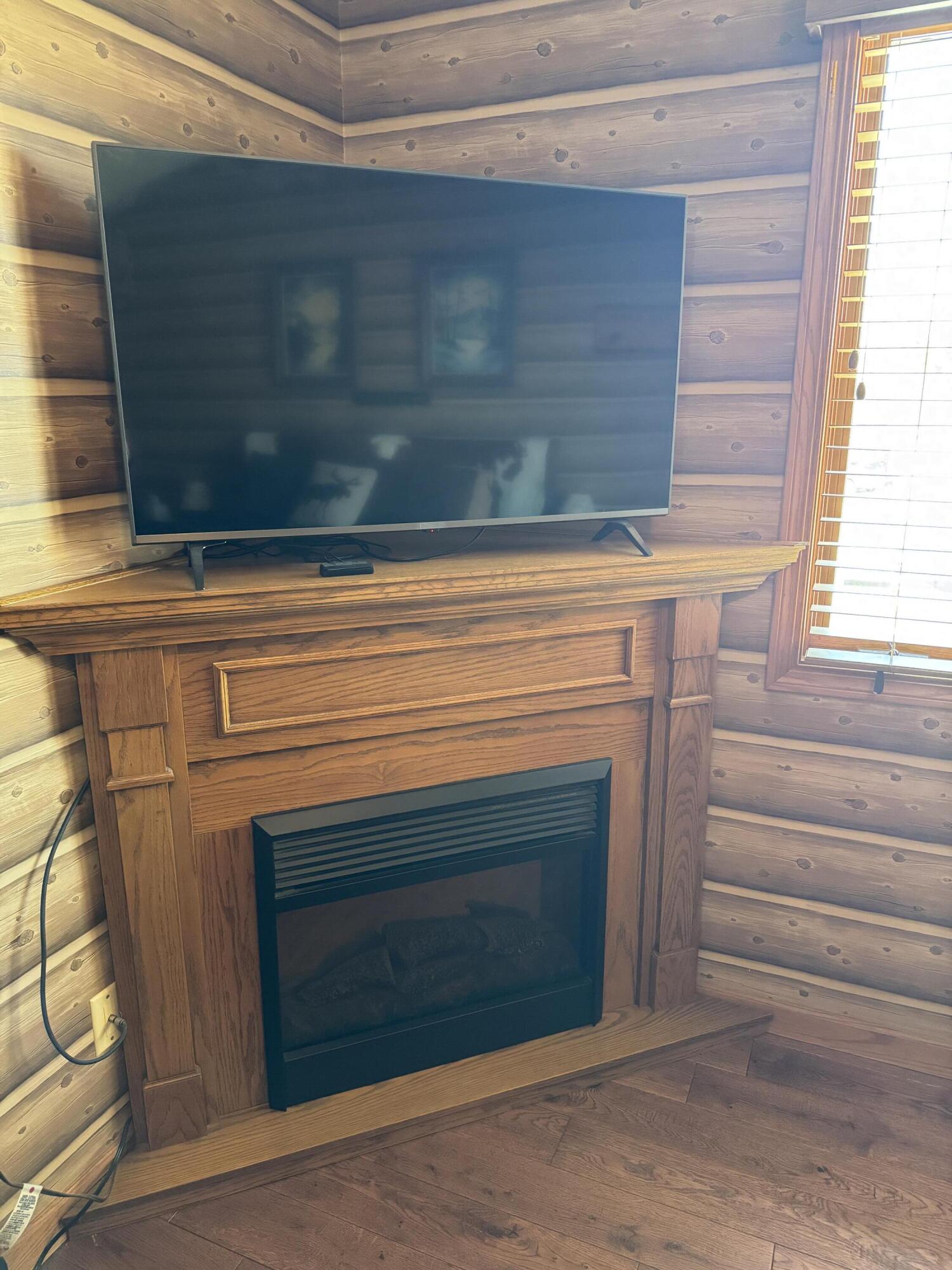 511 Small Farm Road Mukwonago, WI 53149 - Photo 16 of 32 Primary Bedroom Fireplace