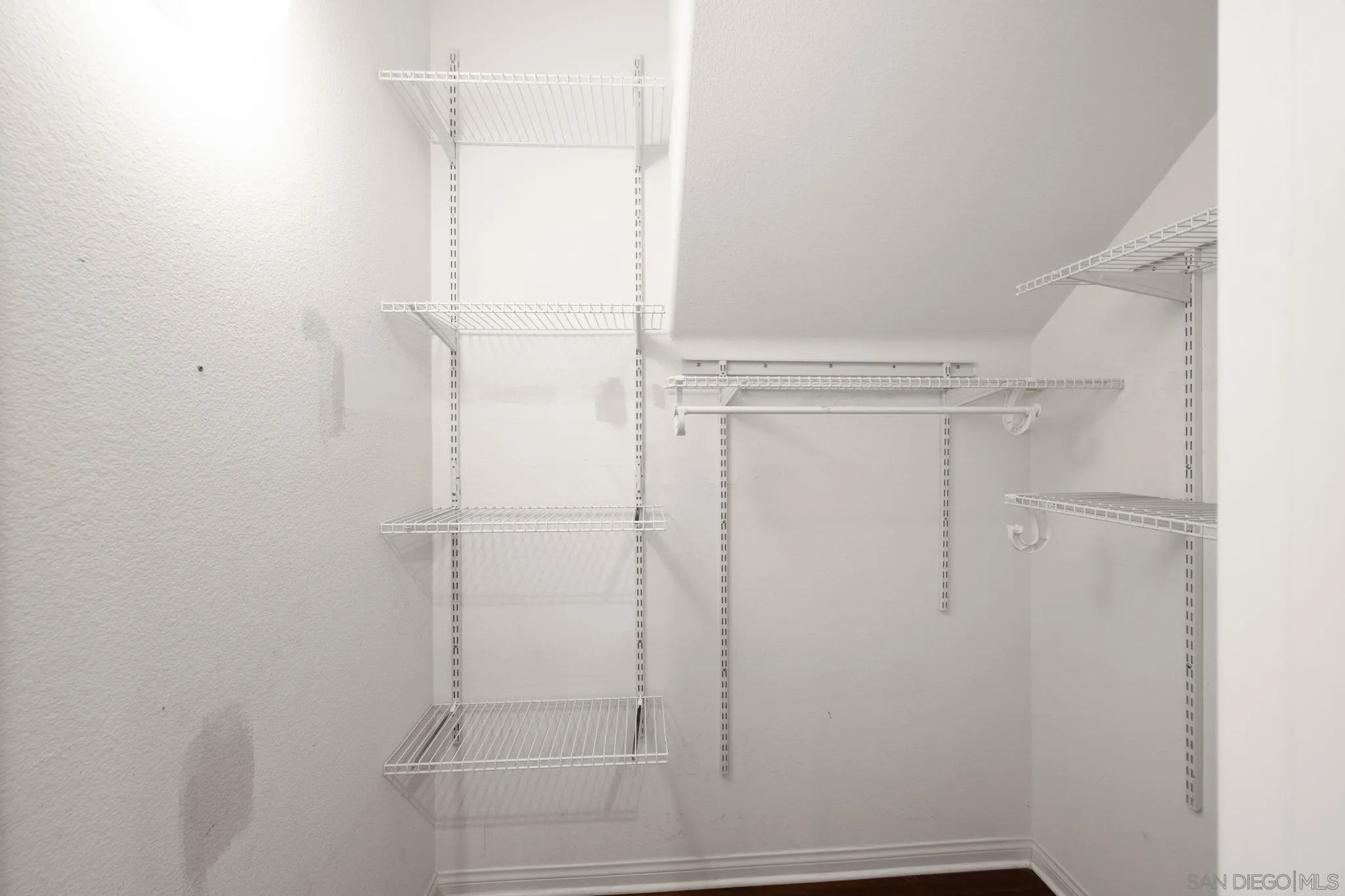 29885 Loy Drive Menifee, CA 92585 - Photo 17 of 75 a bathroom with a glass shower door