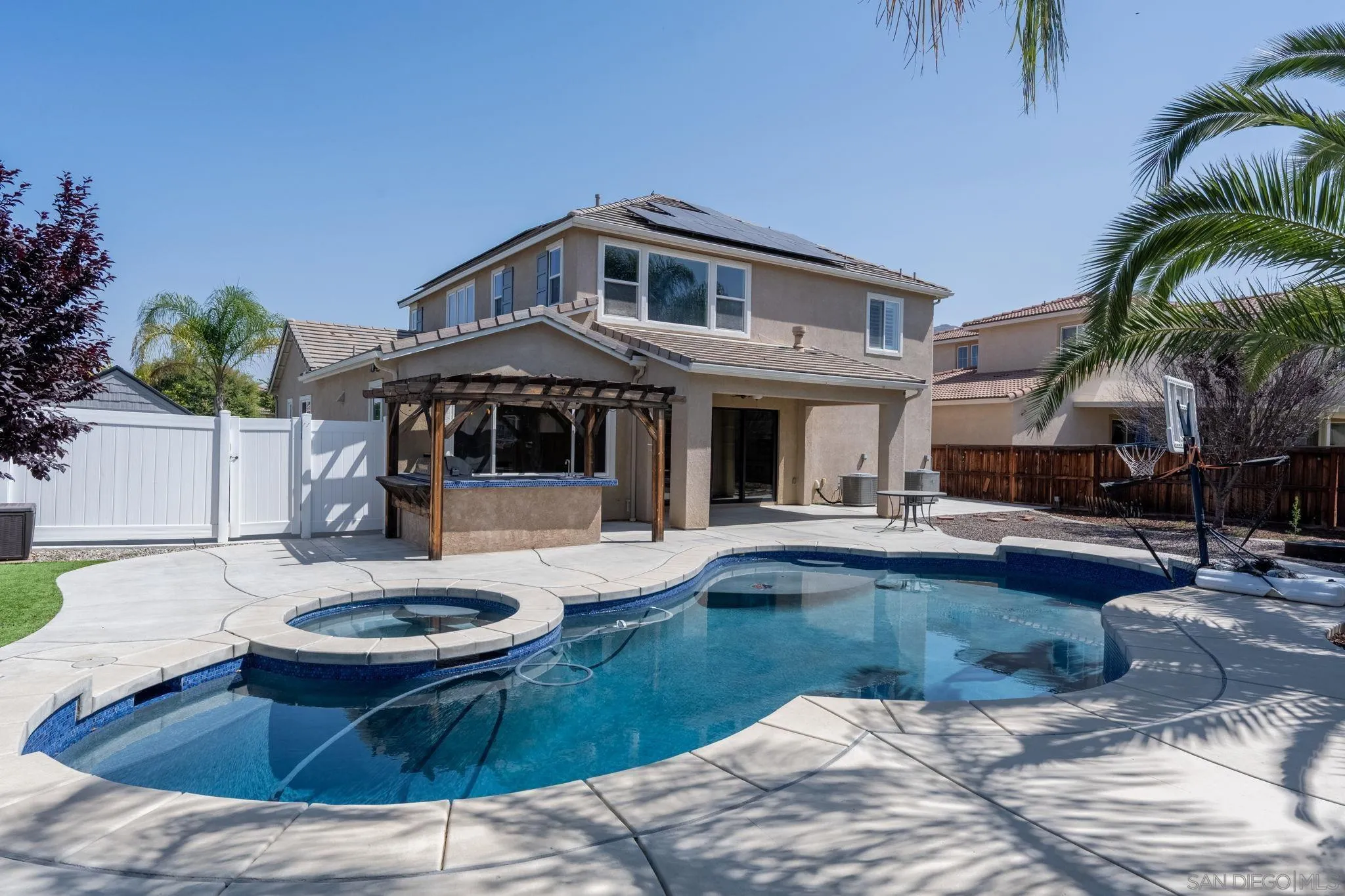 29885 Loy Drive Menifee, CA 92585 - Photo 2 of 75 a front view of a house with swimming pool having outdoor seating