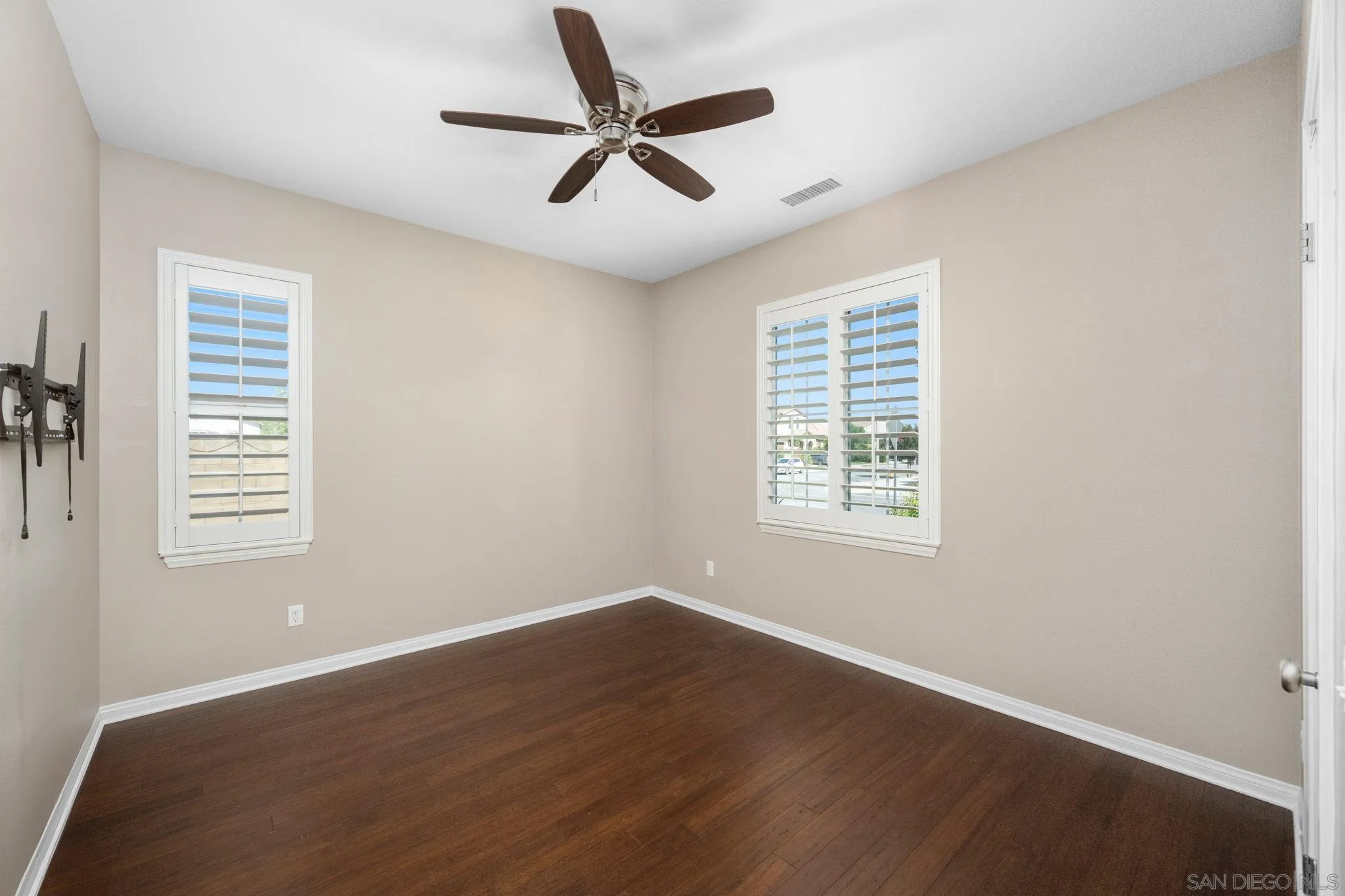 29885 Loy Drive Menifee, CA 92585 - Photo 33 of 75 a view of a livingroom with a window and wooden floor