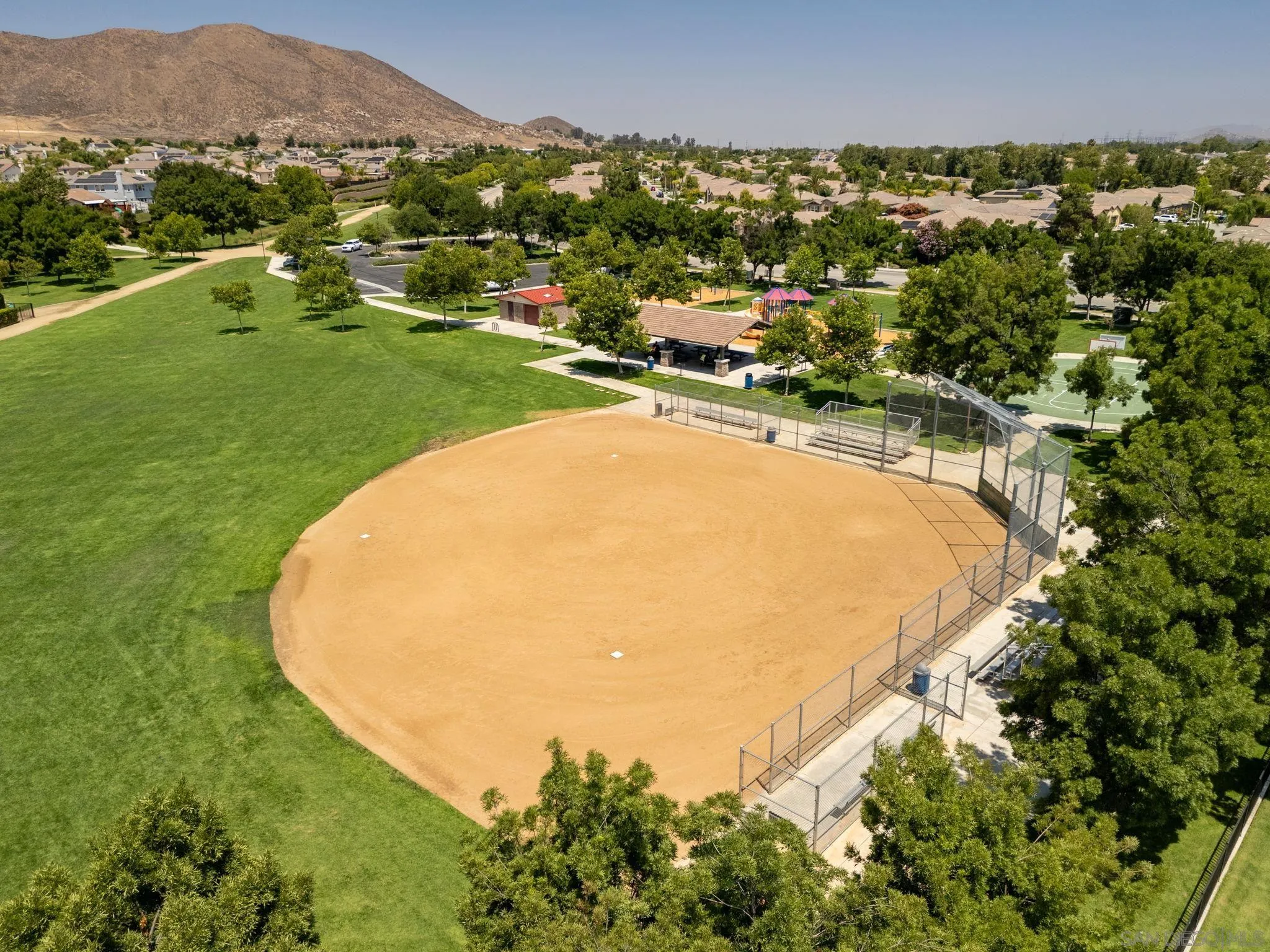29885 Loy Drive Menifee, CA 92585 - Photo 44 of 75 an aerial view of residential houses with outdoor space and trees all around