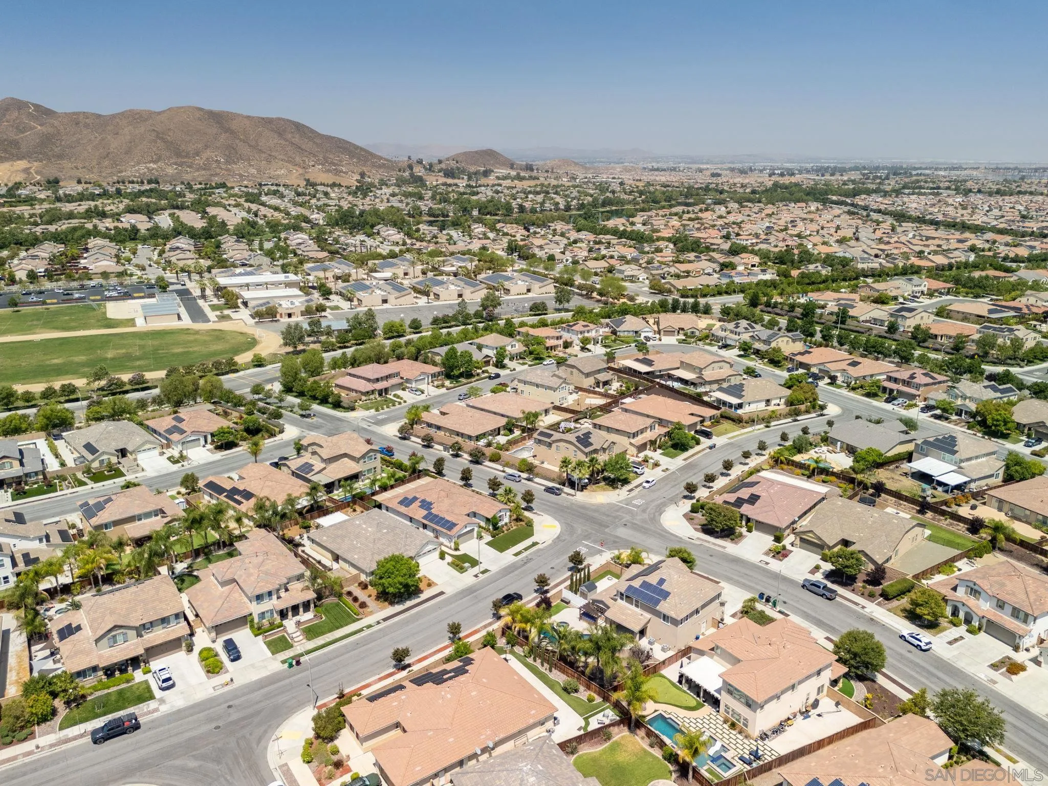 29885 Loy Drive Menifee, CA 92585 - Photo 50 of 75 an aerial view of residential houses with outdoor space and trees