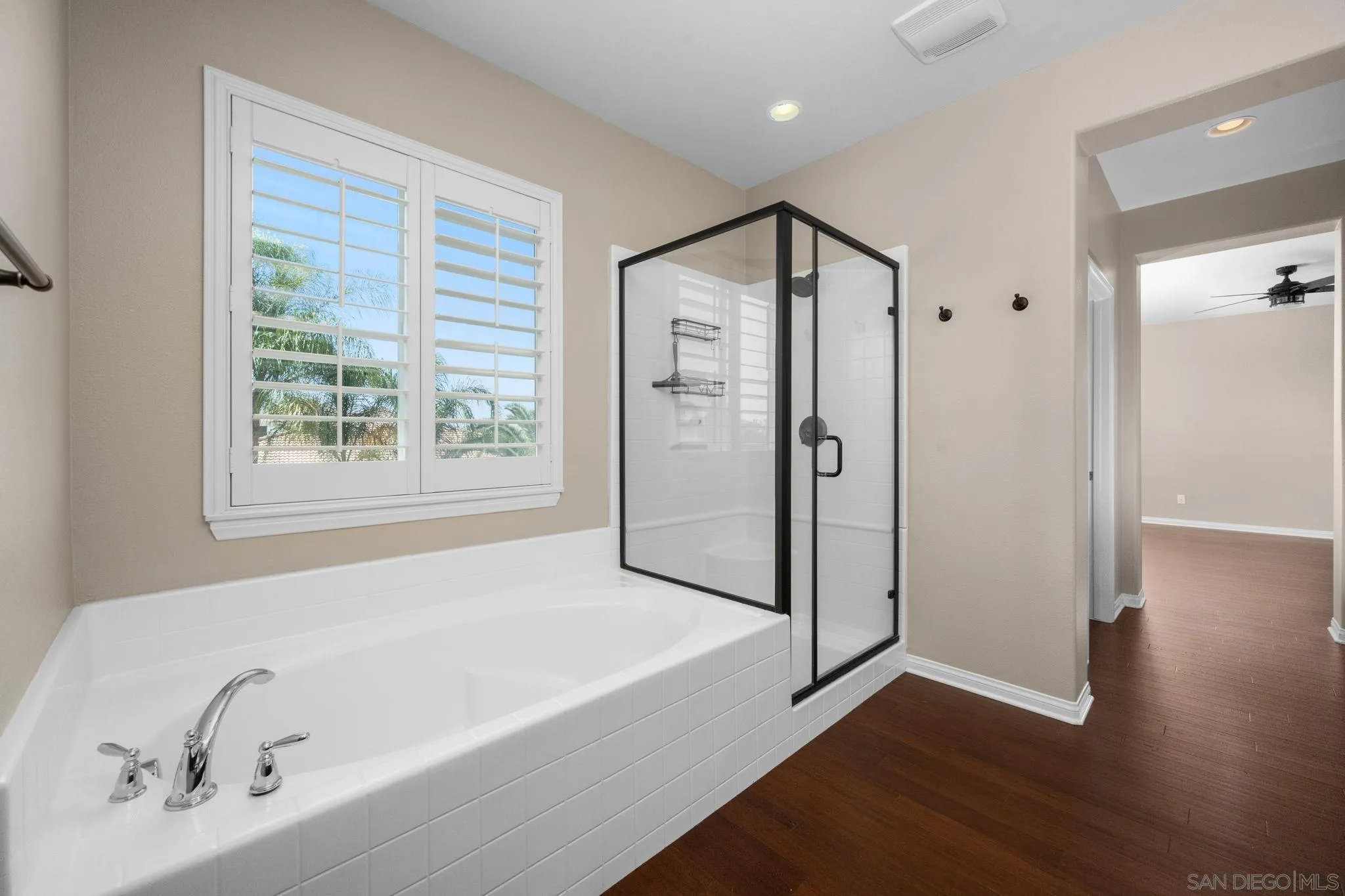 29885 Loy Drive Menifee, CA 92585 - Photo 5 of 75 a bathroom with a bathtub and a shower