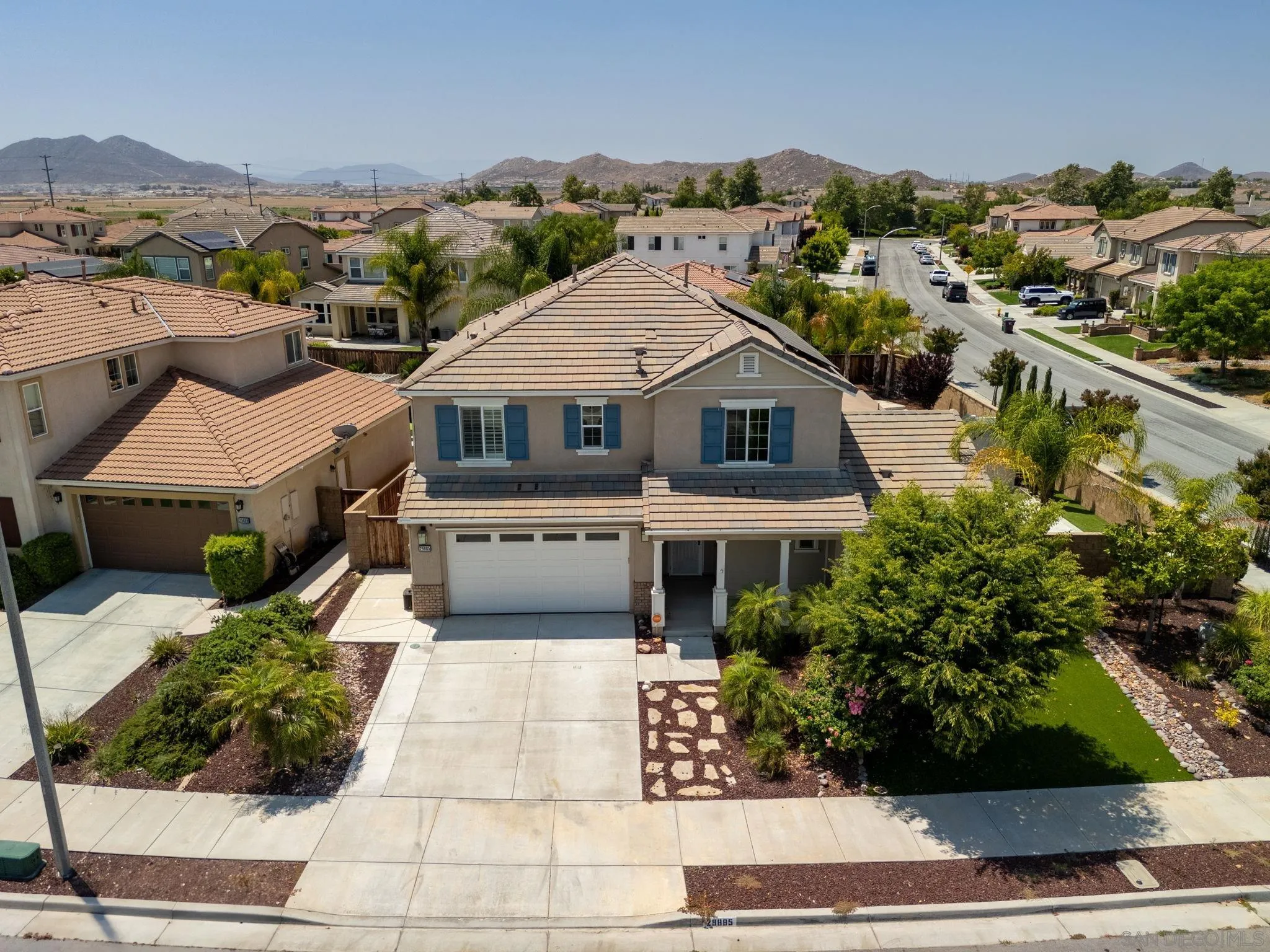 29885 Loy Drive Menifee, CA 92585 - Photo 60 of 75 an aerial view of a house with a yard and large trees