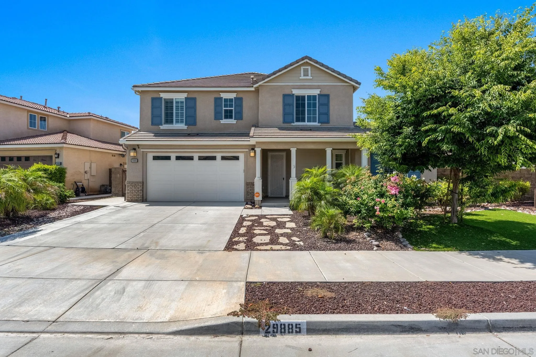 29885 Loy Drive Menifee, CA 92585 - Photo 70 of 75 a front view of a house with a yard