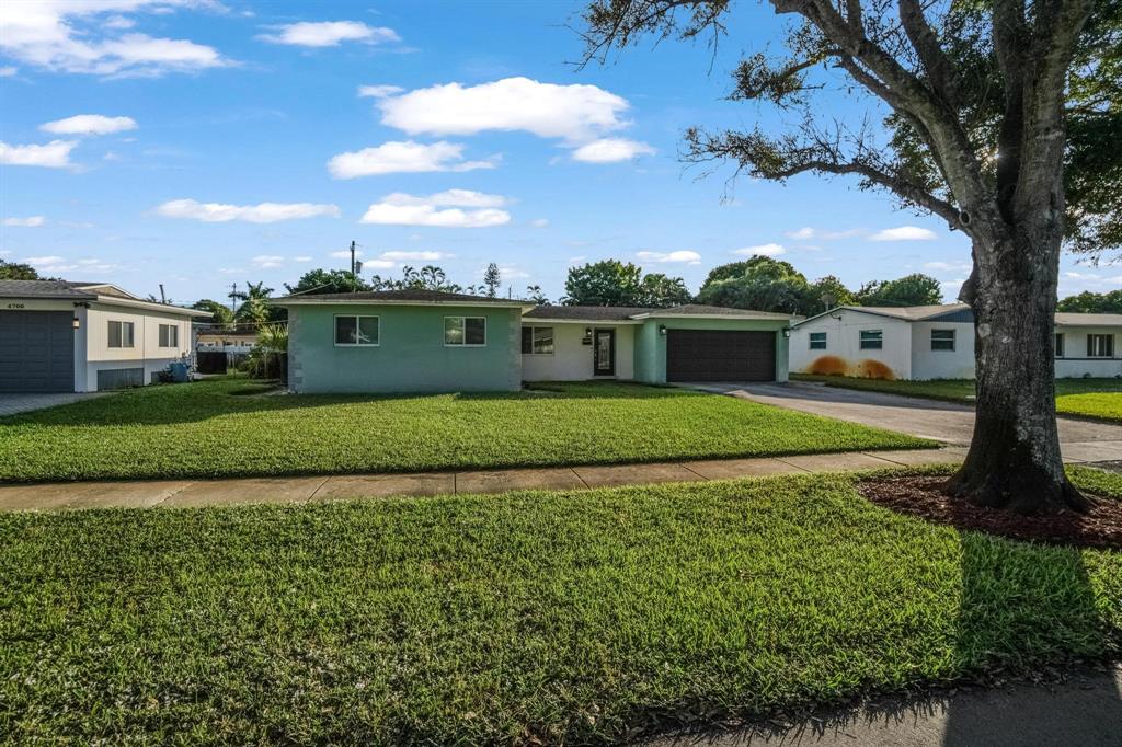 East Plantation Plantation, FL 33317 - Photo 3 of 4 a view of a house with a big yard