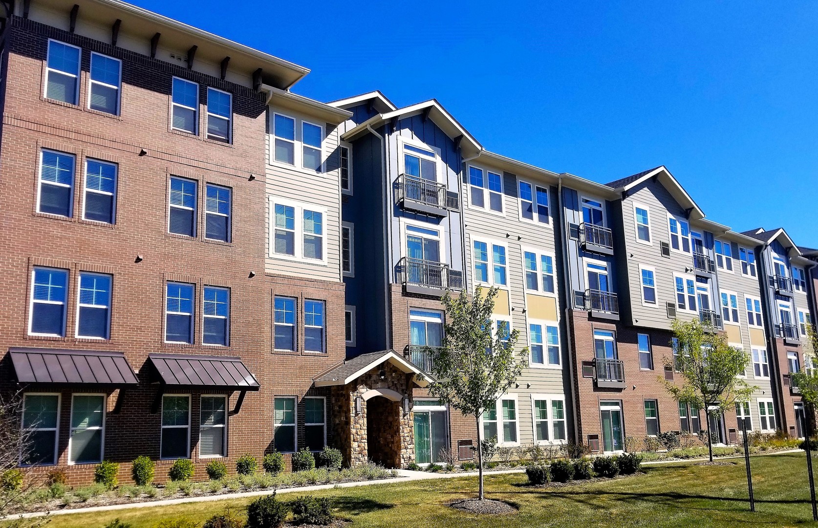 700 East Algonquin Road, Unit 2205 Schaumburg, IL 60173 - Photo 1 of 25 a front view of a building with street view