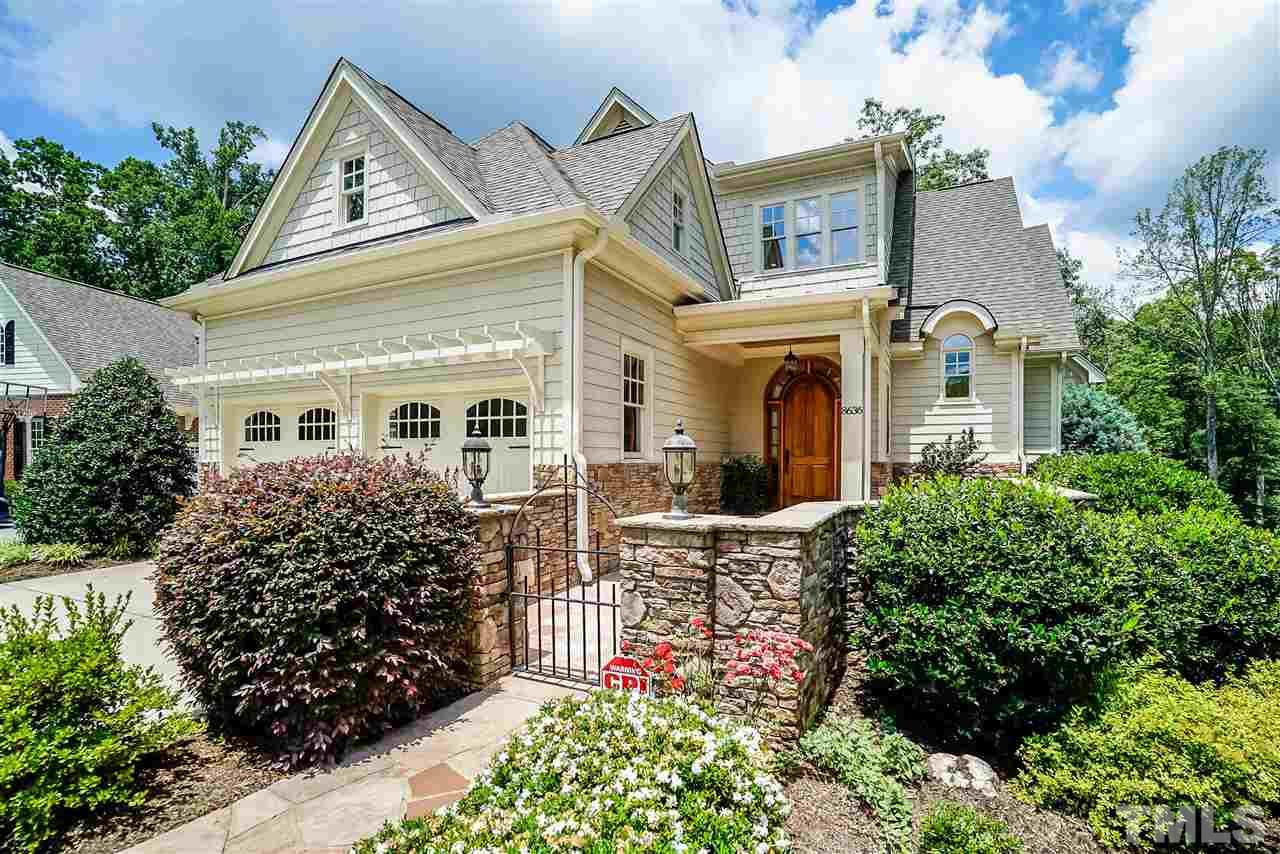 8636 Baybridge Wynd Raleigh, NC 27613 - Photo 1 of 25 front view of a house with a garden