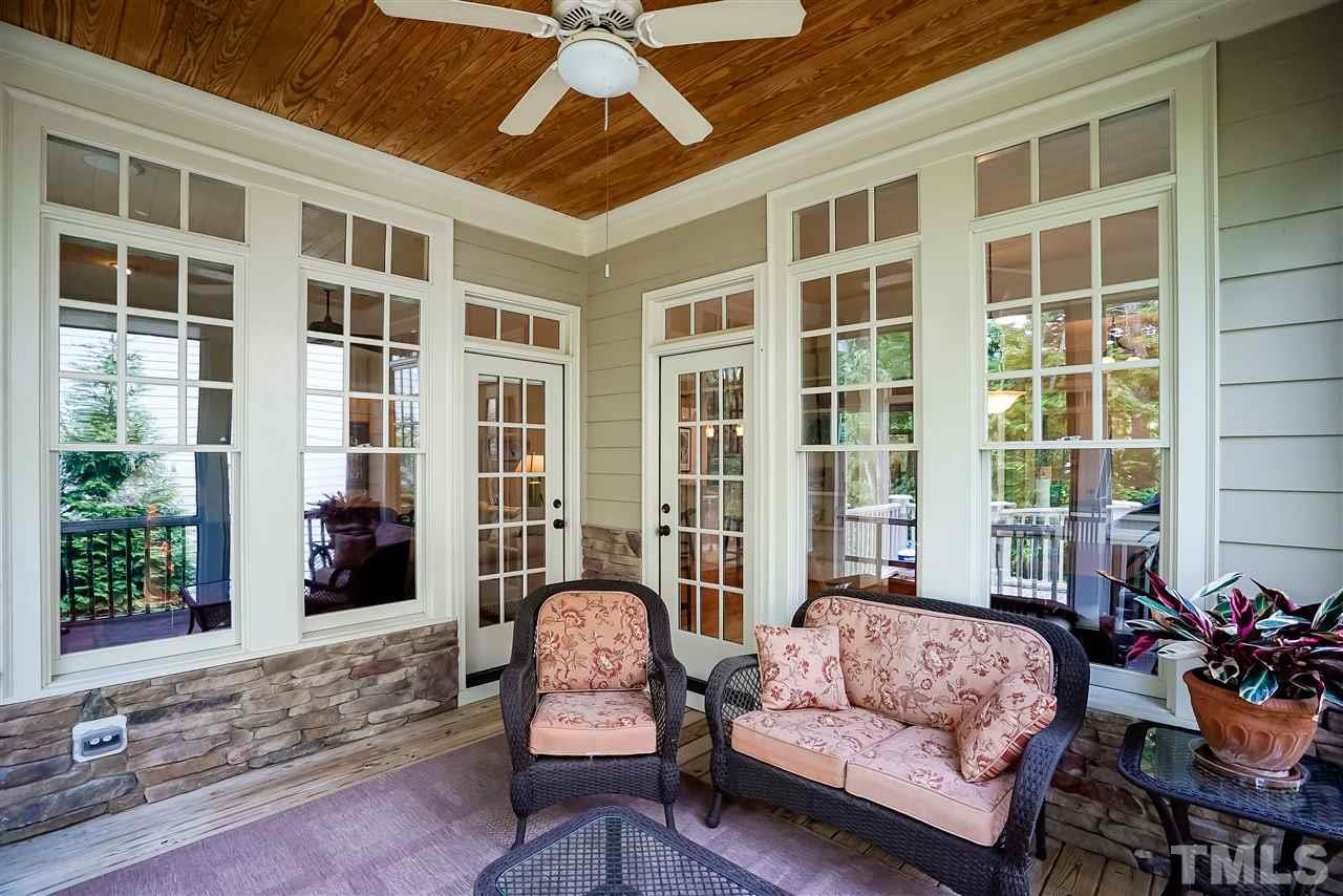 8636 Baybridge Wynd Raleigh, NC 27613 - Photo 22 of 25 a building outdoor space with patio furniture