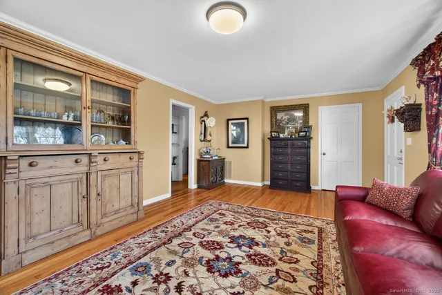 a bedroom with furniture and window