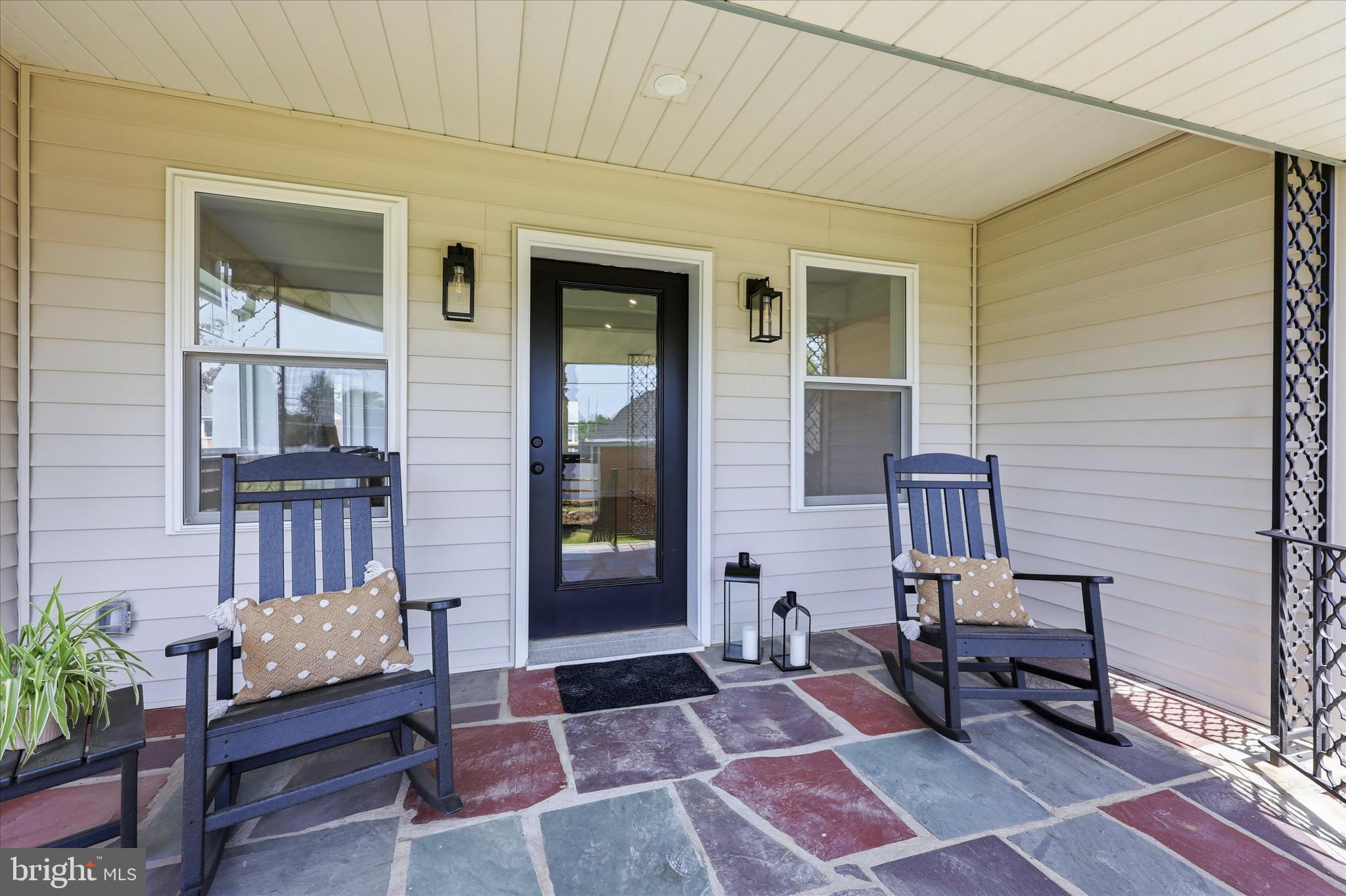 8 James Road Broomall, PA 19008 - Photo 32 of 35 a balcony with furniture and a potted plant