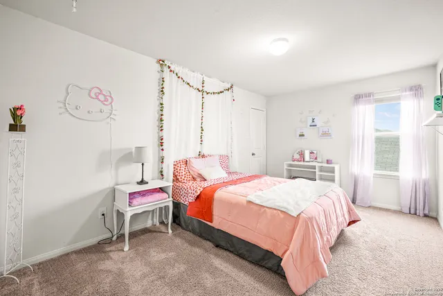 a bathroom with a granite countertop sink a mirror and a shower