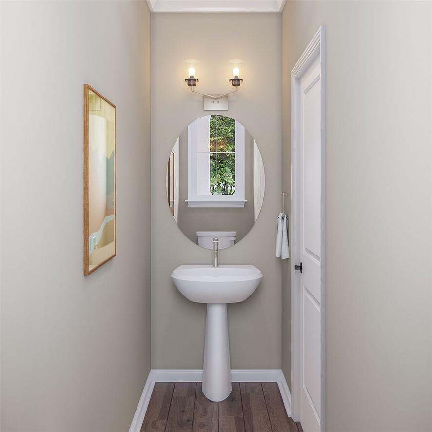 1026 Grays Ml Road Charlotte, NC 28215 - Photo 16 of 18 a bathroom with a sink a mirror and window