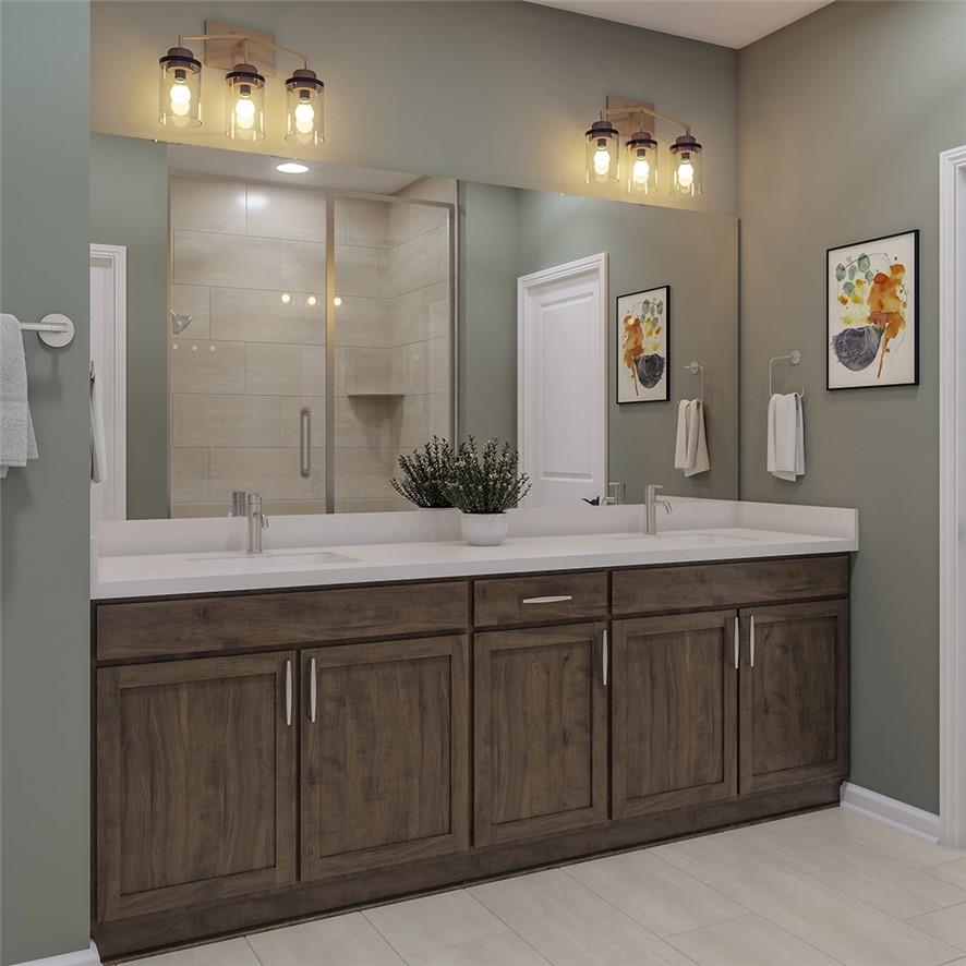 1026 Grays Ml Road Charlotte, NC 28215 - Photo 8 of 18 a bathroom with a double vanity sink and a mirror