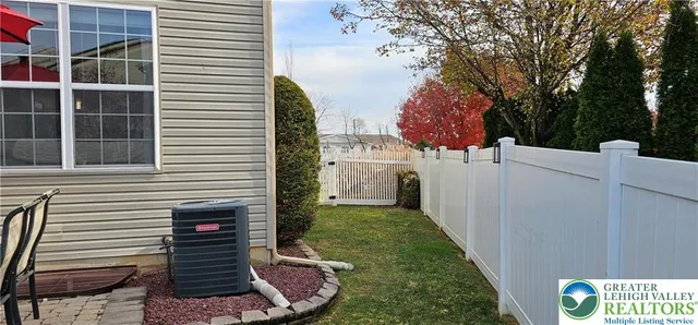 a view of a back yard of the house
