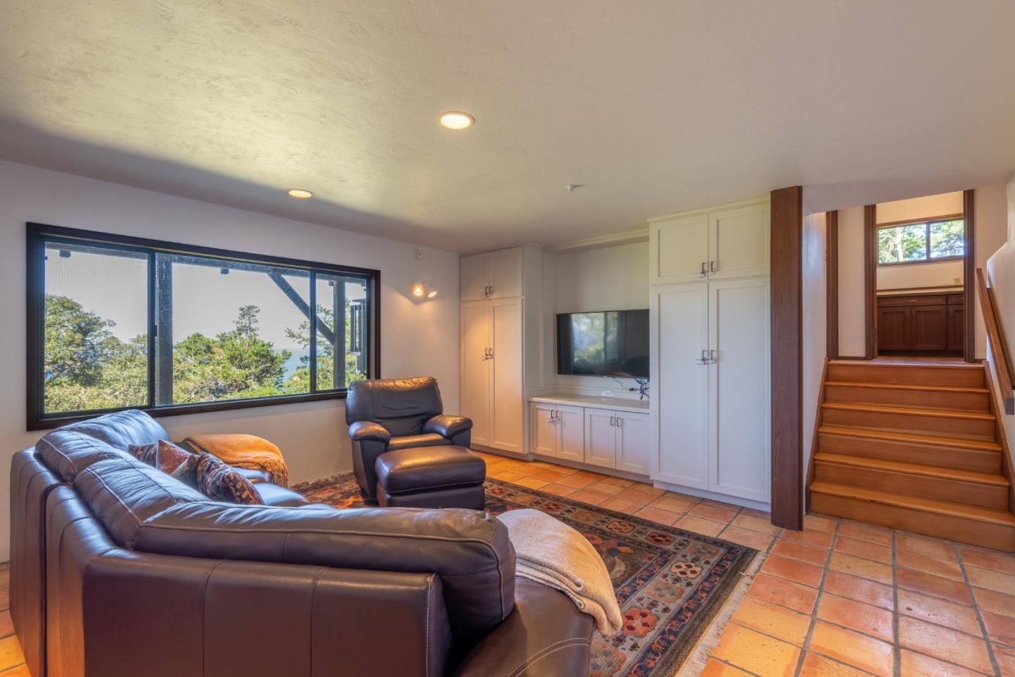 214 Crest Road Carmel, CA 93923 - Photo 13 of 29 a living room with furniture and a flat screen tv