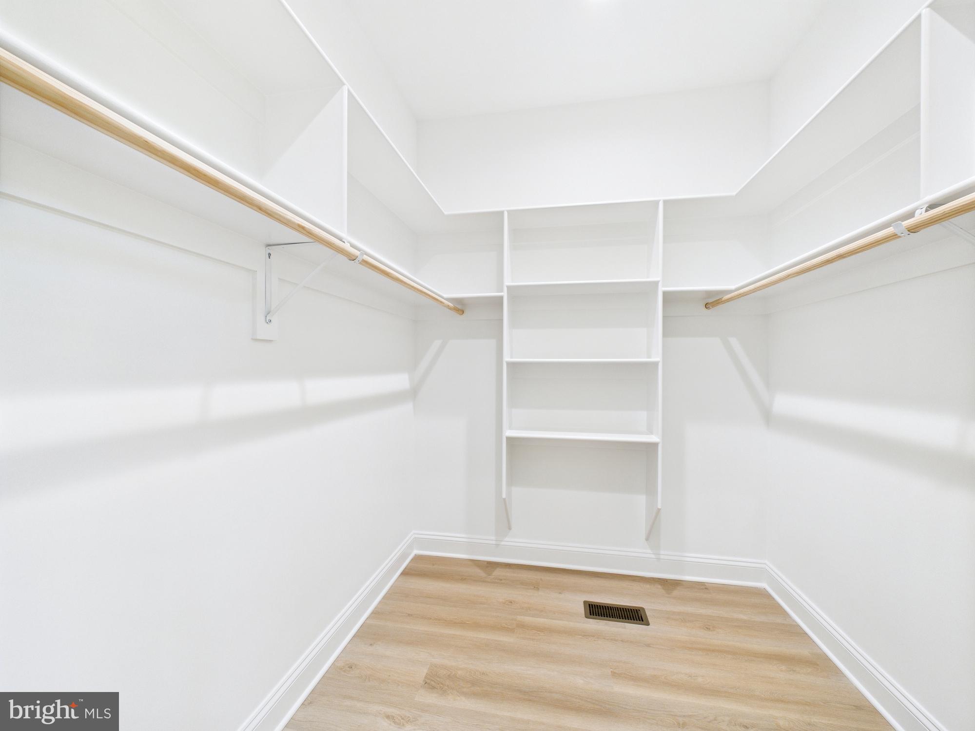 20168 Shingle Point Road Georgetown, DE 19947 - Photo 22 of 44 a view of an empty walk in closet