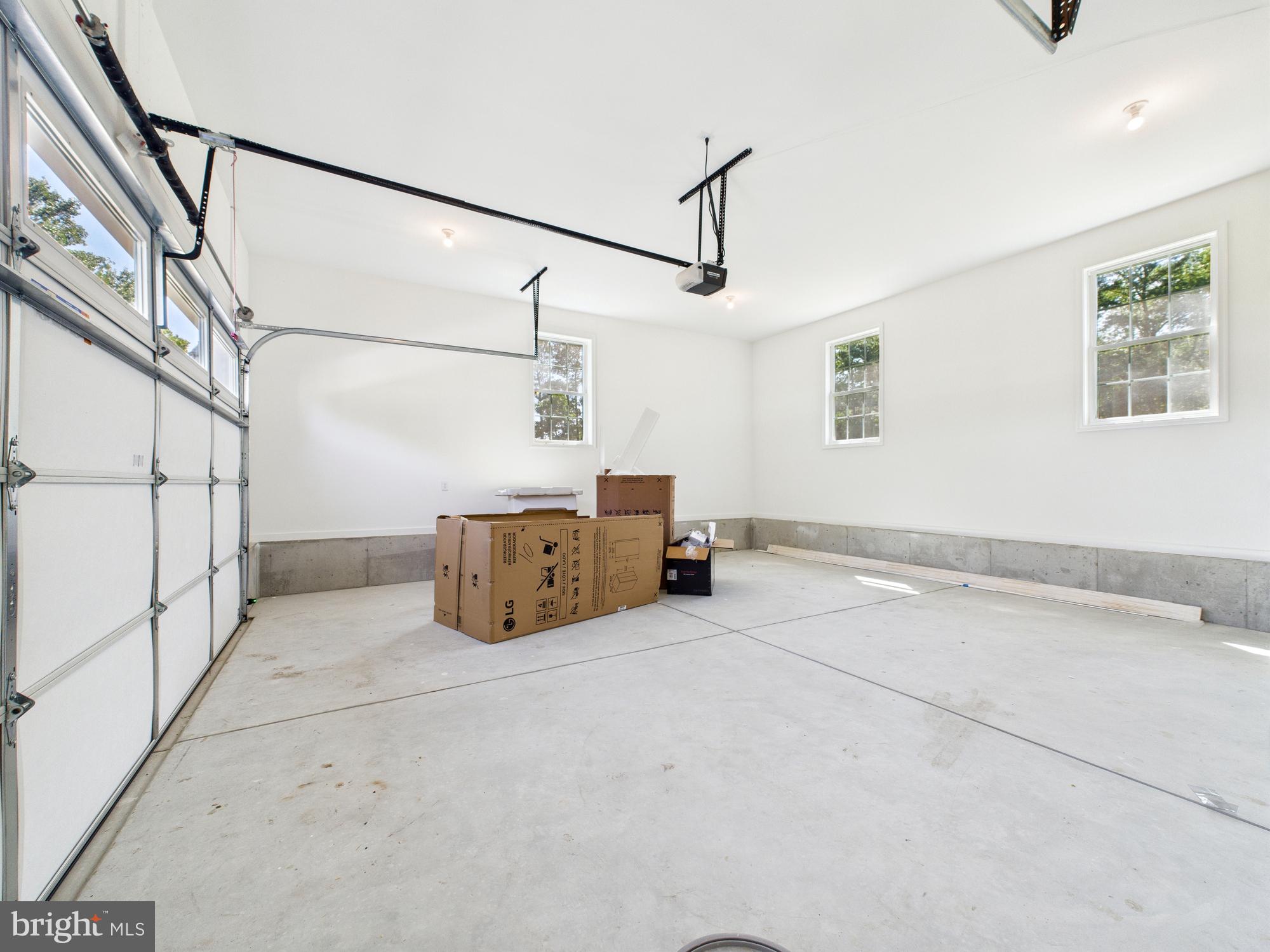 20168 Shingle Point Road Georgetown, DE 19947 - Photo 36 of 44 a view of a garage