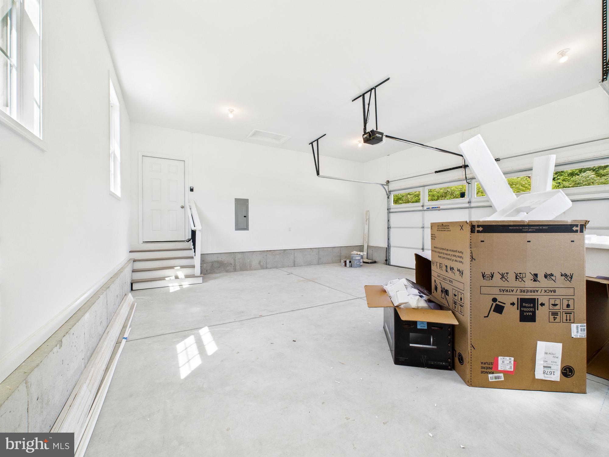 20168 Shingle Point Road Georgetown, DE 19947 - Photo 37 of 44 a storage room with washer and dryer