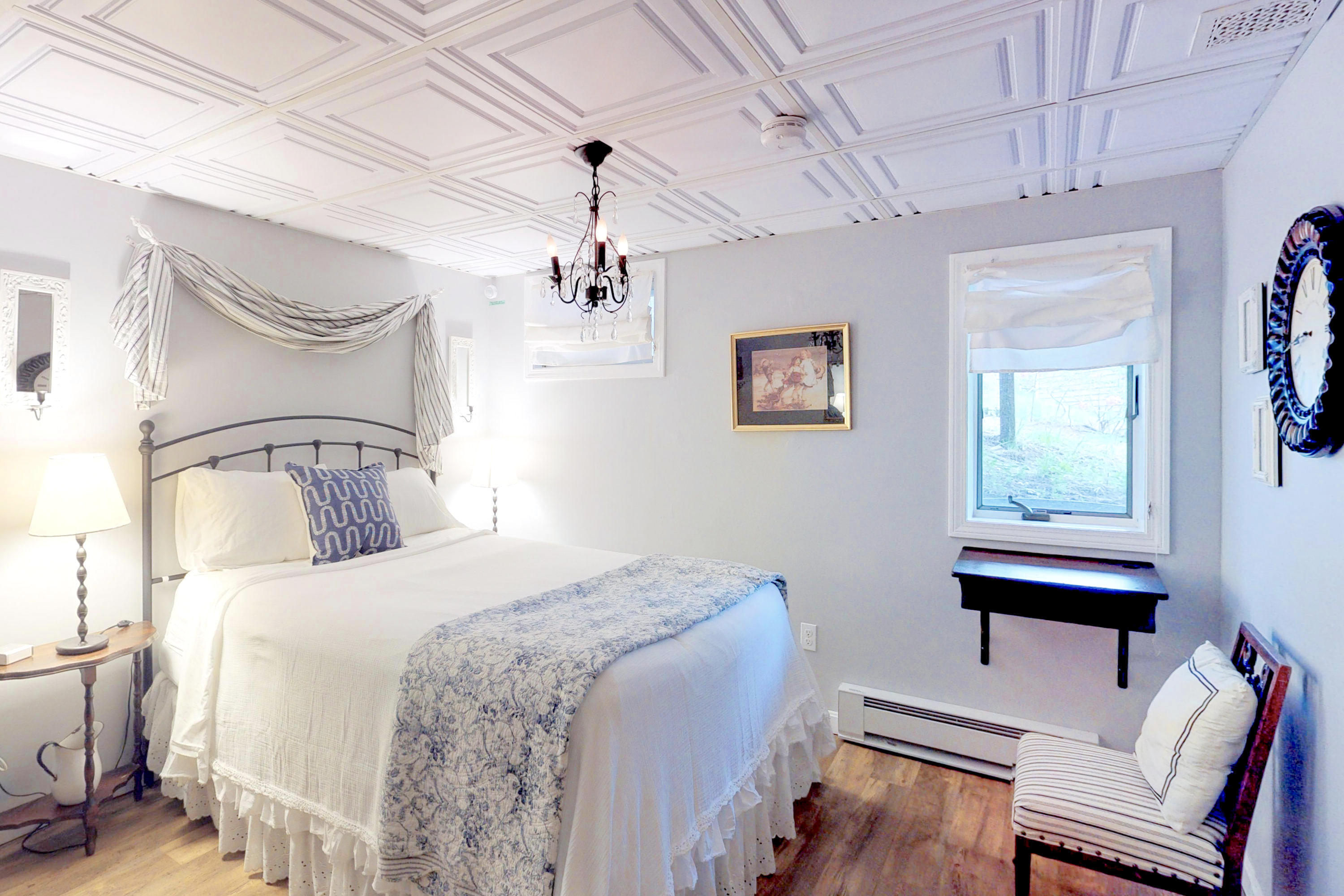 320 Cove View Road Wellfleet, MA 02667 - Photo 18 of 42 a bedroom with a bed and a chair
