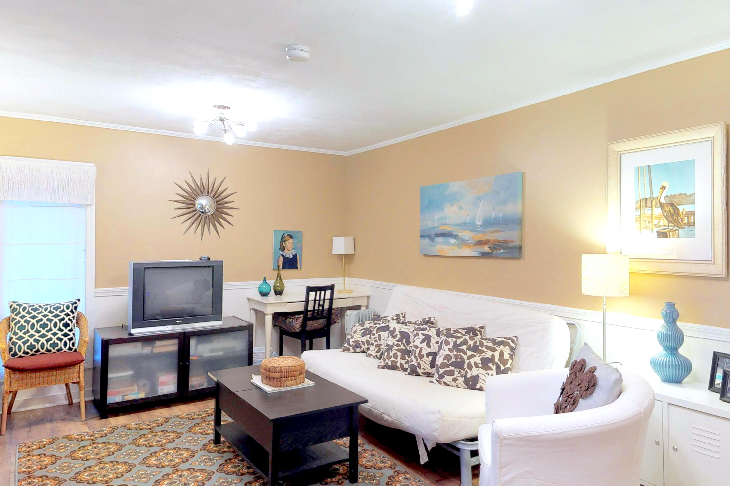 320 Cove View Road Wellfleet, MA 02667 - Photo 21 of 42 a living room with furniture and a flat screen tv
