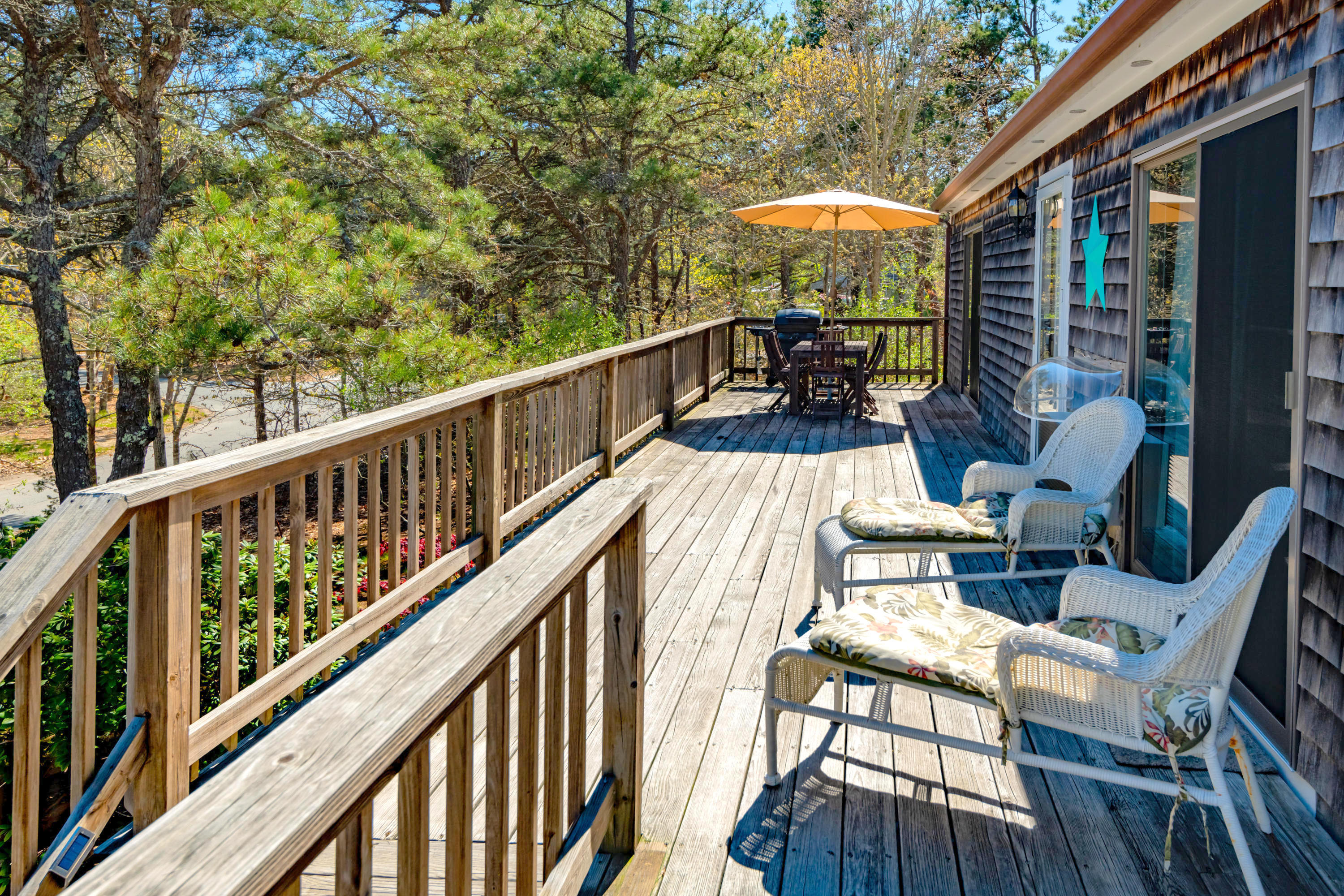 320 Cove View Road Wellfleet, MA 02667 - Photo 27 of 42 a view of balcony with furniture and outdoor seating