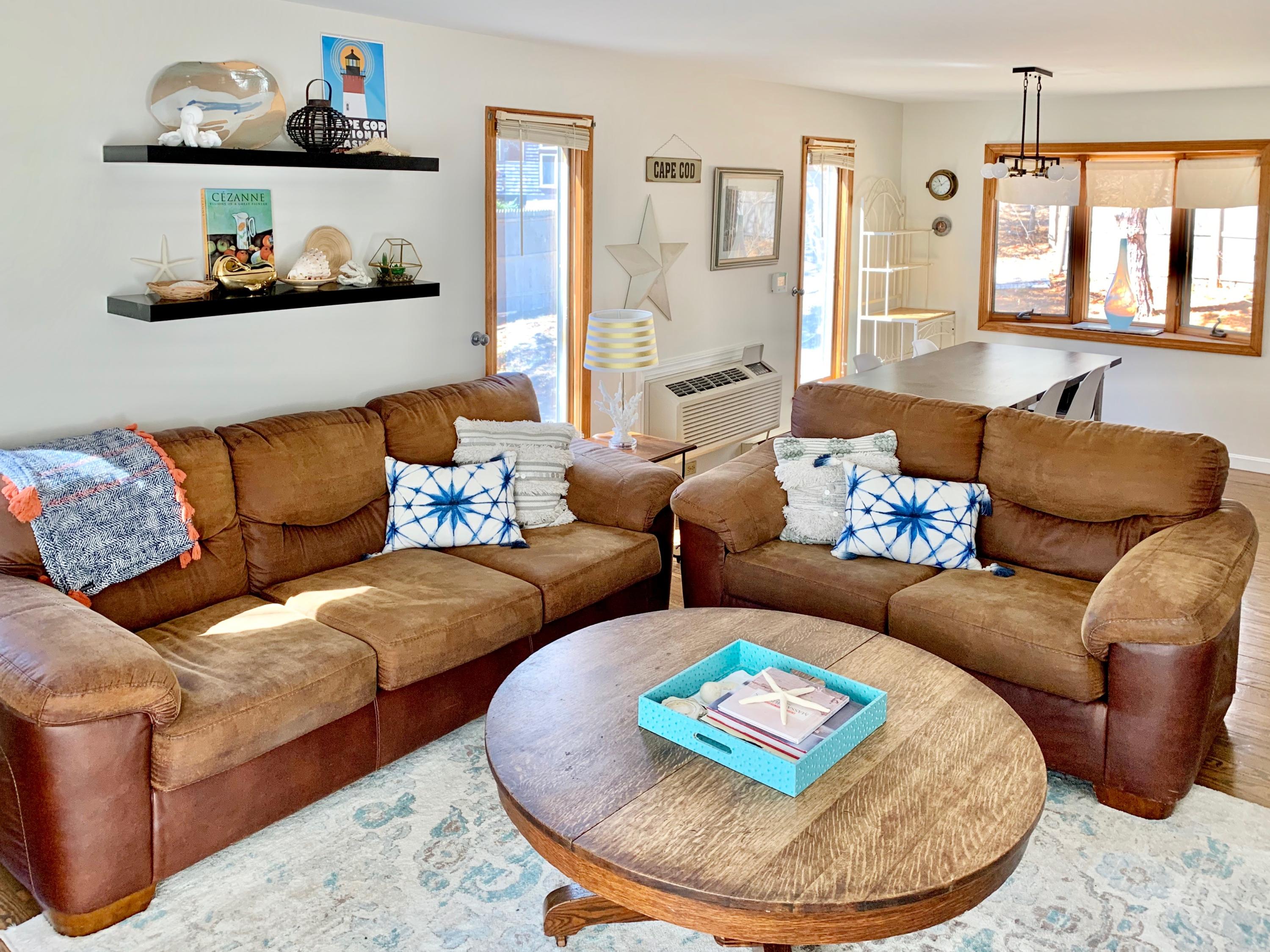 320 Cove View Road Wellfleet, MA 02667 - Photo 4 of 42 a living room with furniture and a large window