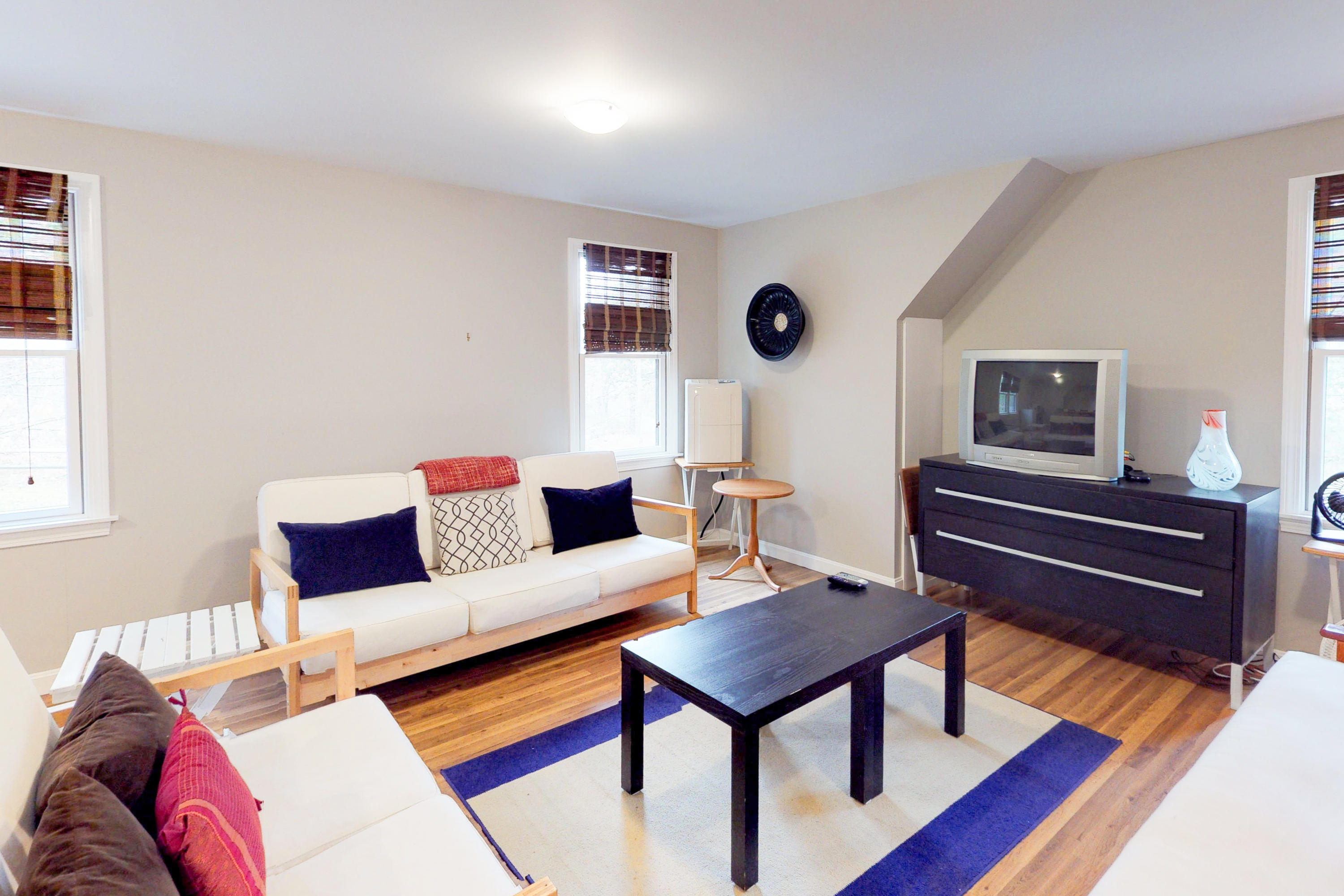 320 Cove View Road Wellfleet, MA 02667 - Photo 41 of 42 a living room with furniture and a wooden floor