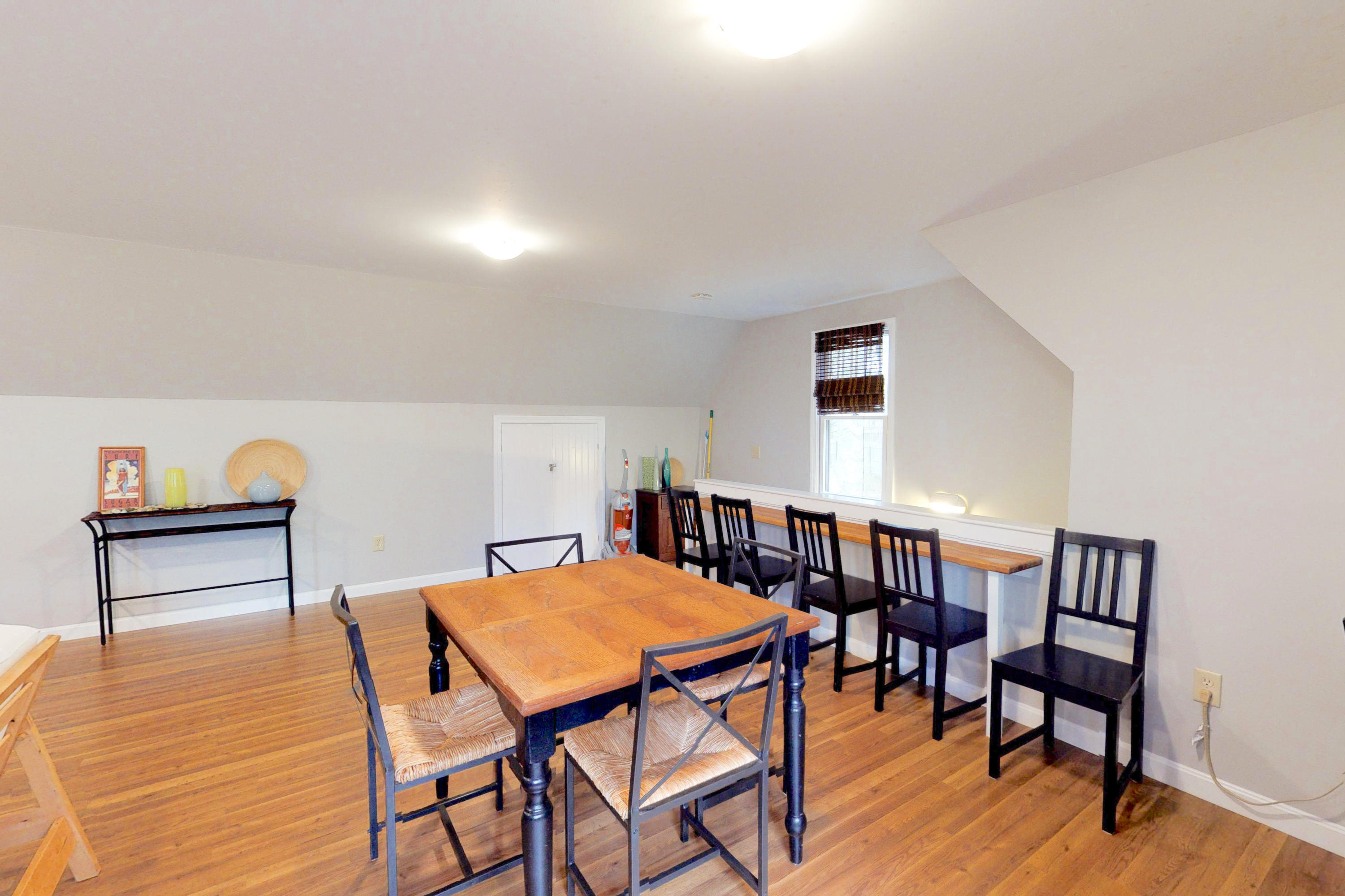 320 Cove View Road Wellfleet, MA 02667 - Photo 42 of 42 a view of a dining room with furniture and wooden floor