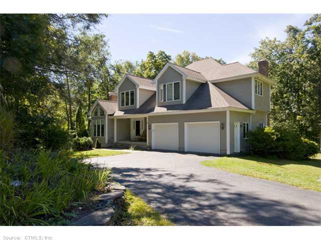 41 Emily Road Marlborough, CT 06447 - Photo 1 of 1 a front view of a house with a yard and garage