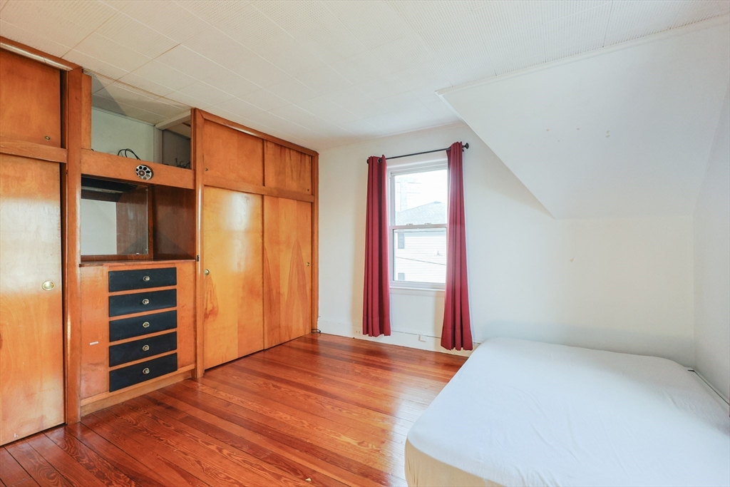 35 Miller Stile Road Quincy, MA 02169 - Photo 16 of 30 a view of room with window and closet