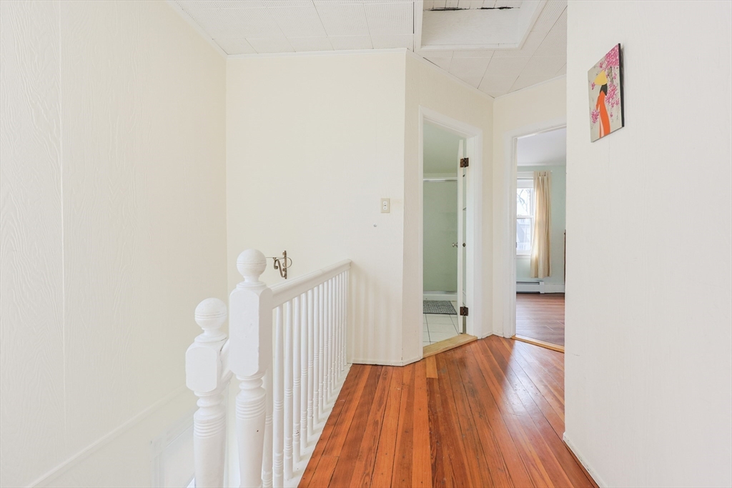 35 Miller Stile Road Quincy, MA 02169 - Photo 19 of 30 a view of a hallway with wooden floor and entryway