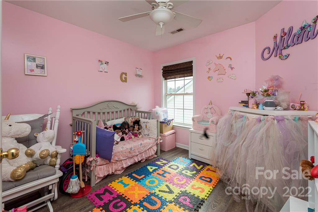 11429 Chapeclane Road Charlotte, NC 28278 - Photo 17 of 26 a children room with toys and a couch