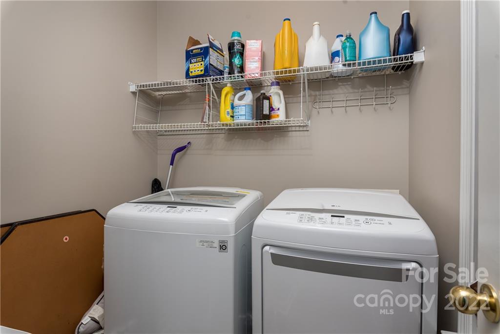 11429 Chapeclane Road Charlotte, NC 28278 - Photo 21 of 26 a utility room with dryer and washer