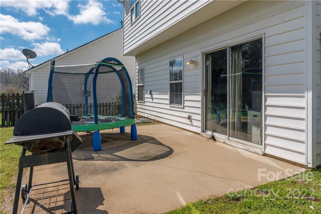 11429 Chapeclane Road Charlotte, NC 28278 - Photo 23 of 26 a house view with a seating space