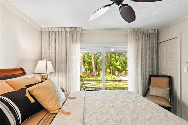 a bathroom with a toilet sink and shower