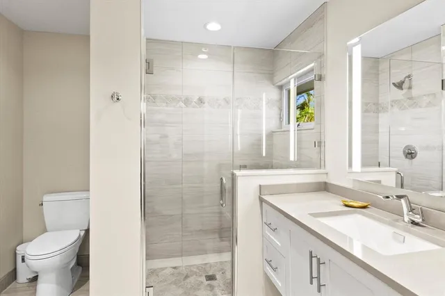a living room with fireplace furniture and a flat screen tv