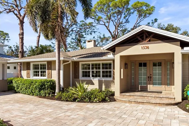 a view of a car park in front of house