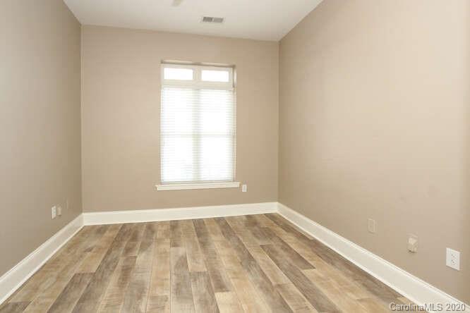 1700 Camden Road, Unit 201 Charlotte, NC 28203 - Photo 17 of 30 an empty room with a window