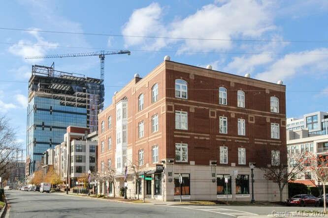 1700 Camden Road, Unit 201 Charlotte, NC 28203 - Photo 27 of 30 a city street lined with tall buildings